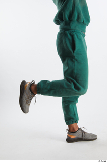 Nathaniel  1 dressed flexing green jogging pants grey sneakers…